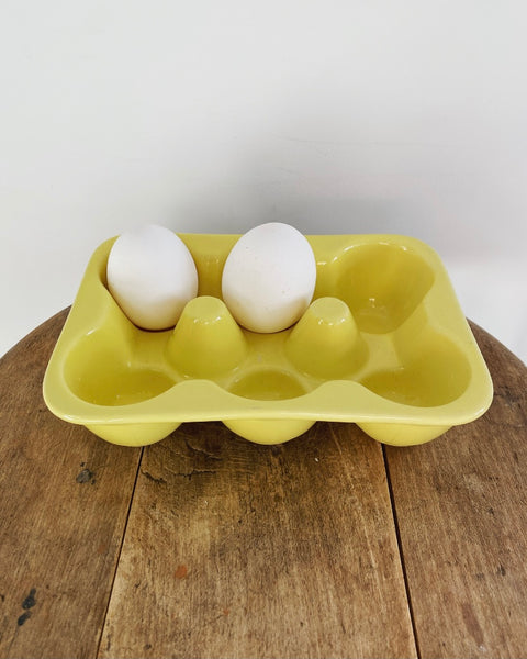 Vintage ceramic soft yellow egg holder